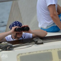regatta participant watching through binoculars